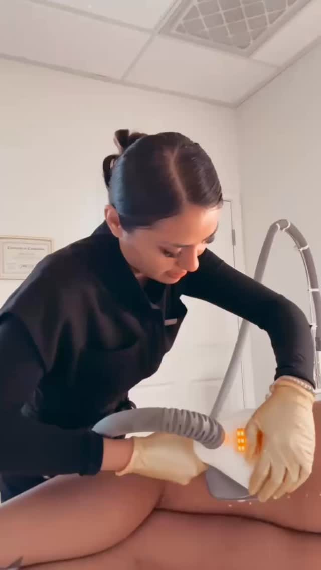Esthetician performing a VelaShape II body contouring treatment at Beyond Skin & Body Care